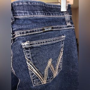 Women’s Wrangler boot cut jeans.